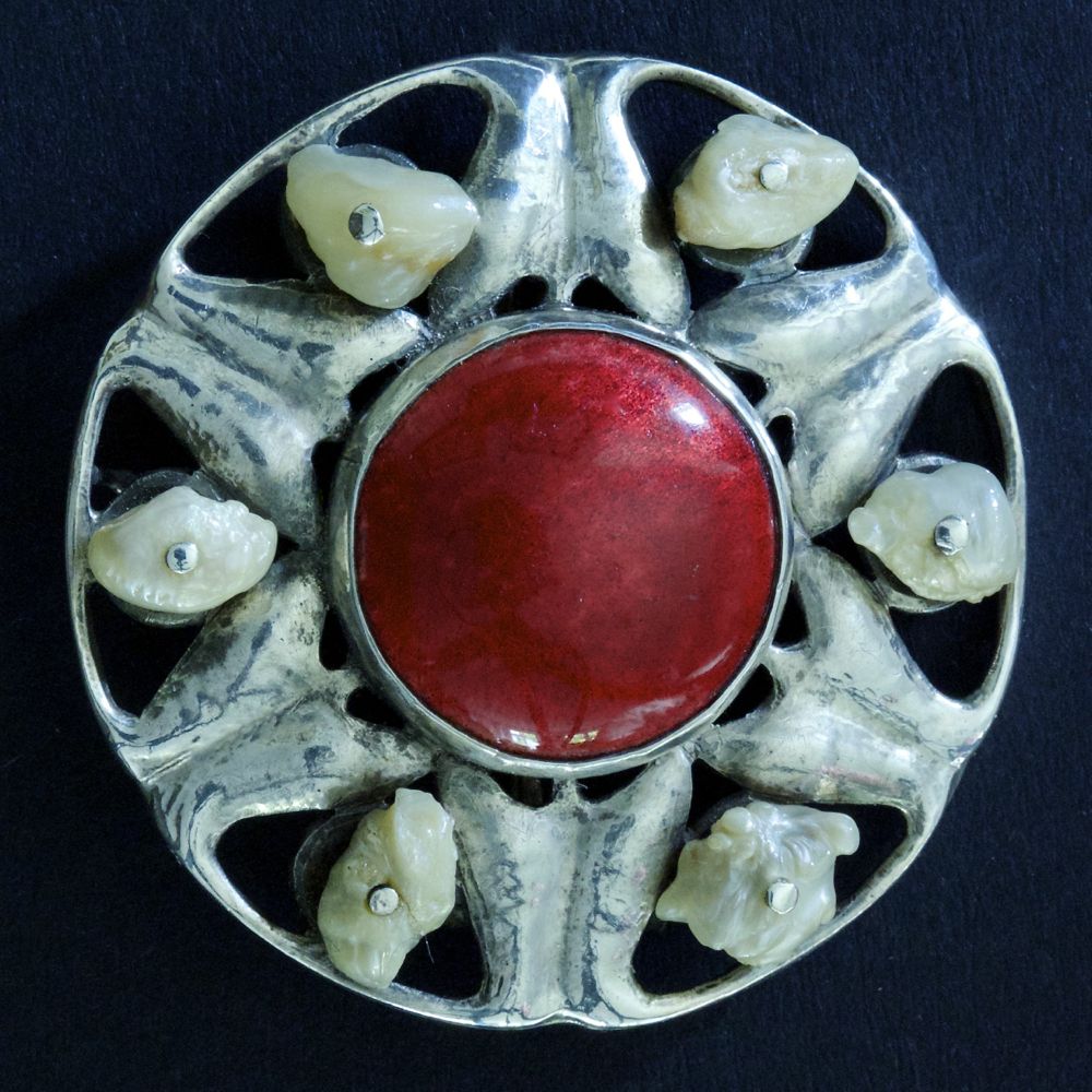Guild of Handicrafts, silver and enamel brooch.