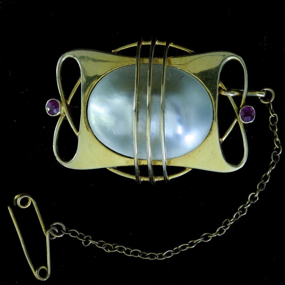 Murrle Bennett, gold, pearl, and ruby brooch, marked MBC, 15ct.