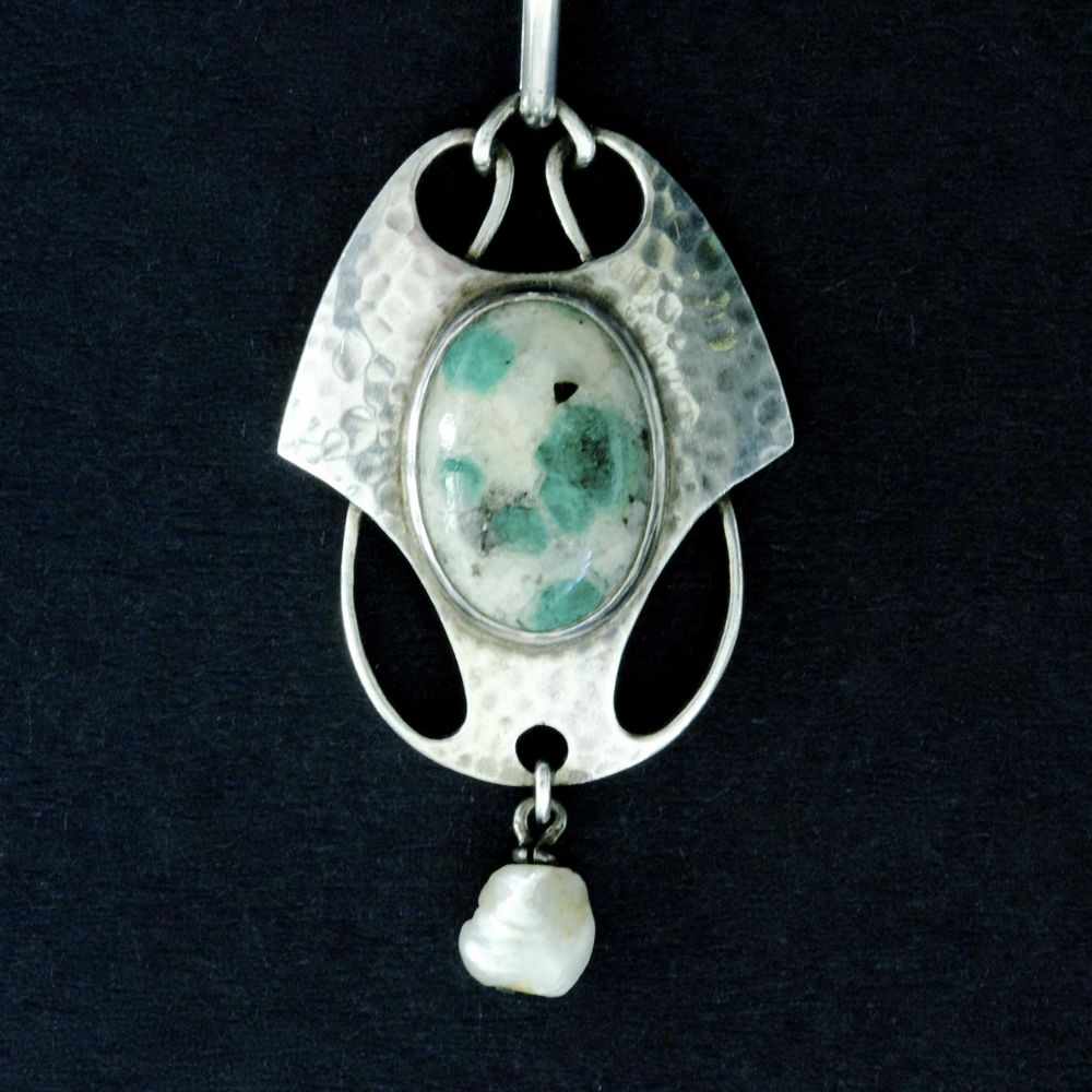 Murrle Bennett, silver and semi-precious stone pendant.