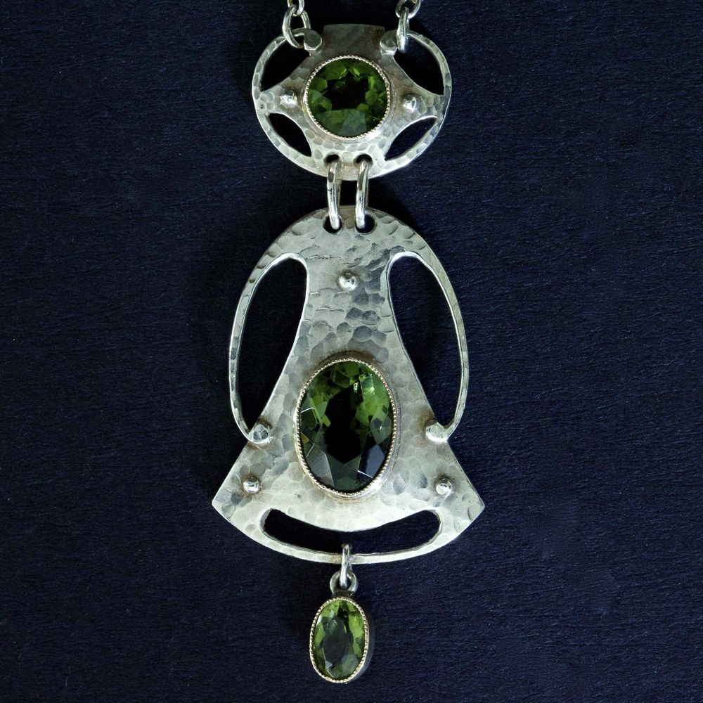 Murrle Bennett, silver and peridot pendant.